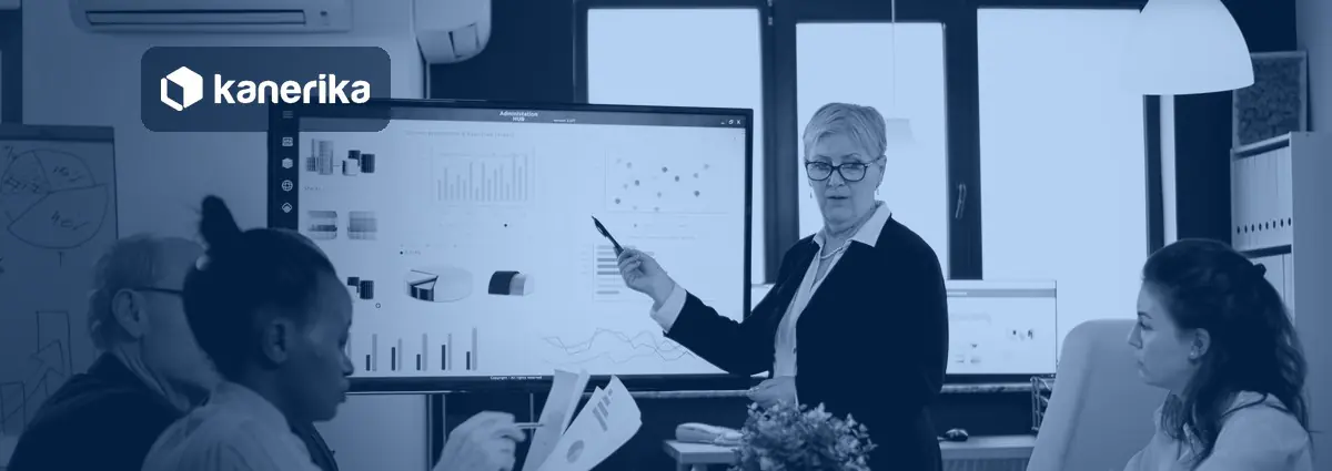 Ontology vs semantic layer banner showing a data team reviewing business metrics on a screen