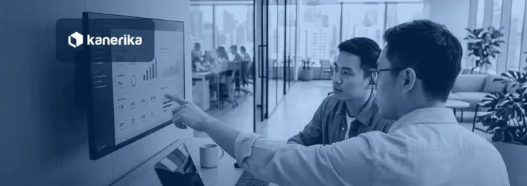 Qlik Sense vs Power BI comparison banner showing two colleagues reviewing a business intelligence dashboard on an office display