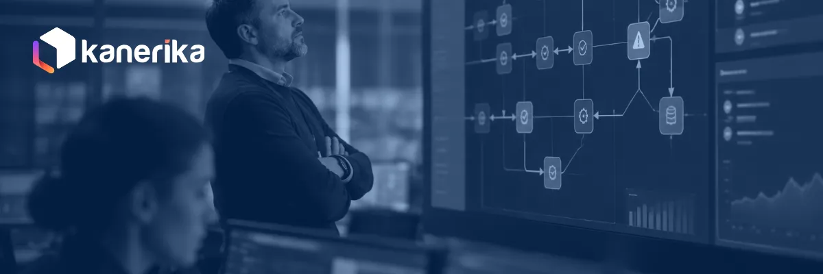 Operations manager reviewing an automated workflow with an alert on a monitoring wall