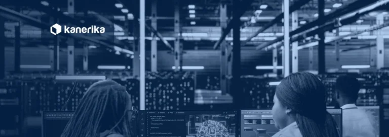 Engineers monitoring AI model dashboards and traces at workstations in a data center, navy-toned Kanerika banner for AI observability tools