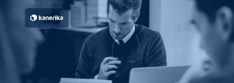 Insurance agent reviewing paperwork during a client meeting, representing automation in insurance