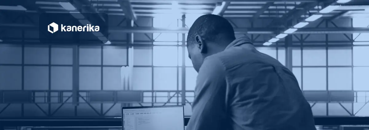 Engineer in a navy-blue tinted data center working on a laptop, banner for a post on which cloud automation tools actually work in 2026
