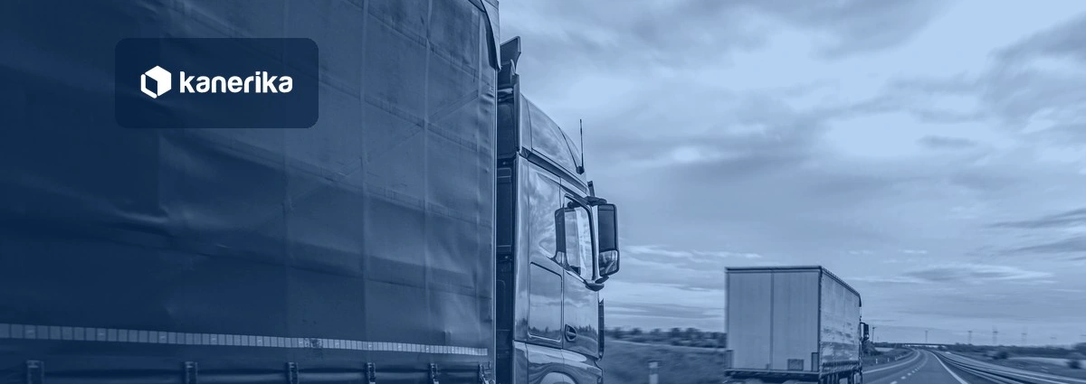 Freight truck driving on a highway at dusk, navy-toned Kanerika banner for data analytics in logistics