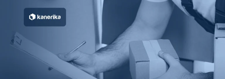 Courier's hand holding a clipboard checklist next to a taped cardboard box, representing a data migration checklist, shown in a navy blue tint with the Kanerika logo