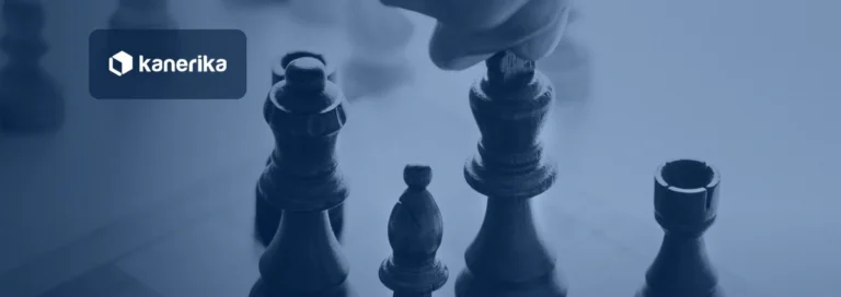 Hand moving a chess piece on a board, representing decision intelligence and strategic choices, shown in a navy blue tint with the Kanerika logo