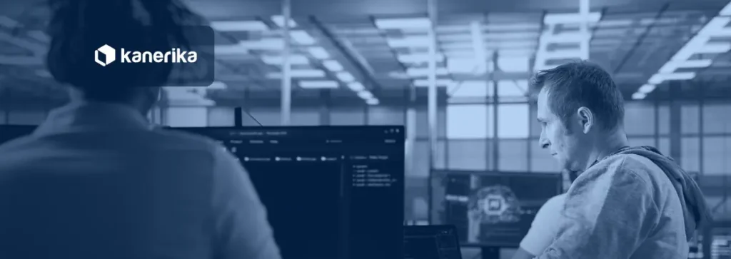 Engineers monitoring AI agent infrastructure on screens in a high-tech server room