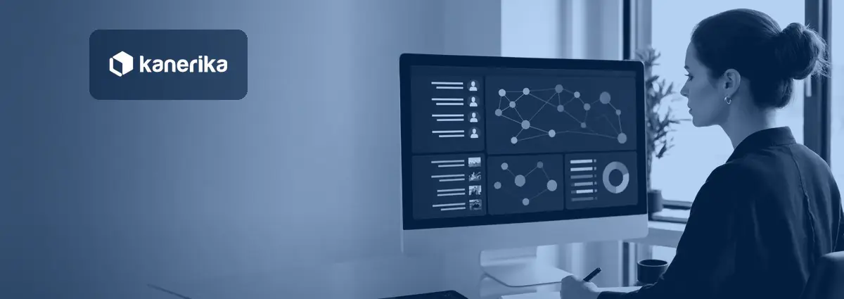 Analyst reviewing a business intelligence dashboard on a desktop monitor, hero image for business intelligence statistics 2026