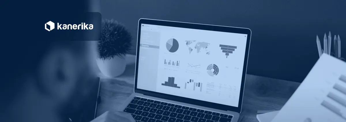 Kanerika banner for DAX calculated columns and tables in Microsoft Fabric, a laptop showing a Power BI style analytics dashboard