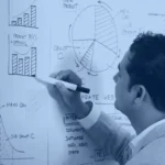 Engineer sketching a system diagram on a wall poster, illustrating how a generative AI architecture is planned
