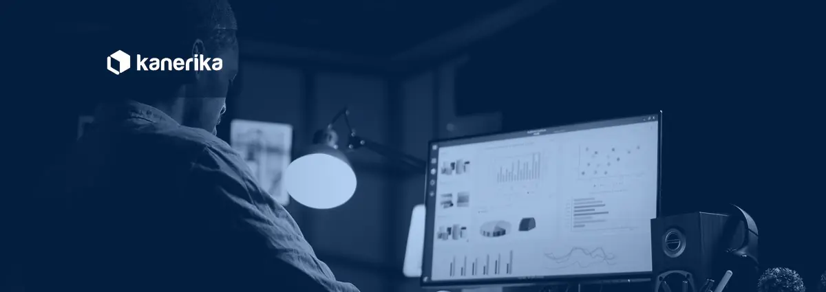 Analyst reviewing a monitoring dashboard on a screen, illustrating LLM observability and monitoring