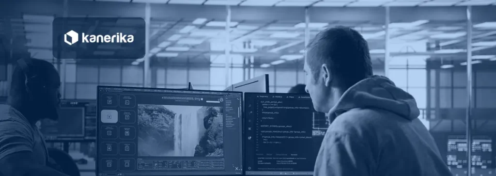 Engineers reviewing video and code on screens, a multimodal AI models workspace