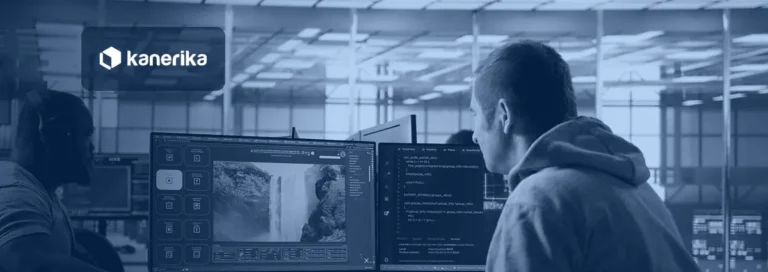 Engineers reviewing video and code on screens, a multimodal AI models workspace
