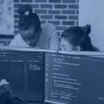 Developers reviewing open source AI agents code on multiple screens in a team office