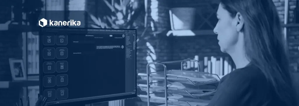 Employee typing a question into an AI chat assistant at a desk, illustrating a RAG application answering from company documents