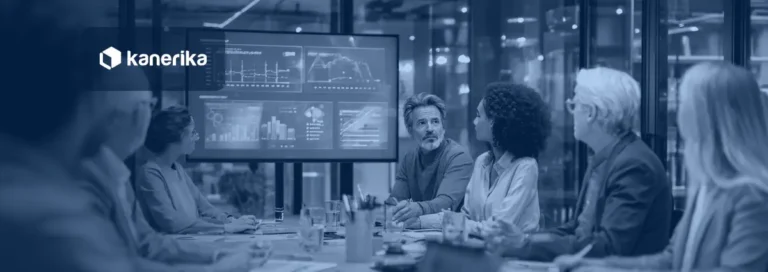 Business team in a modern conference room reviewing data dashboards on a wall screen, a photo for the Microsoft Fabric vs Databricks comparison