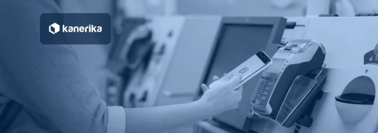 Shopper paying with a phone at a self-checkout terminal, representing retail automation, shown in a navy blue tint with the Kanerika logo